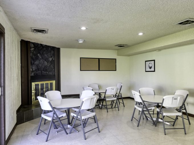 community clubhouse interior, tables and chairs